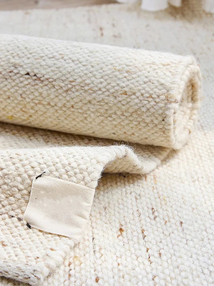 tapis blanc en laine
