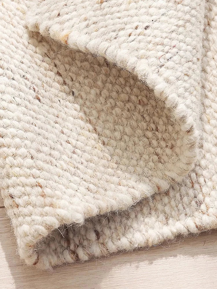 tapis blanc en laine